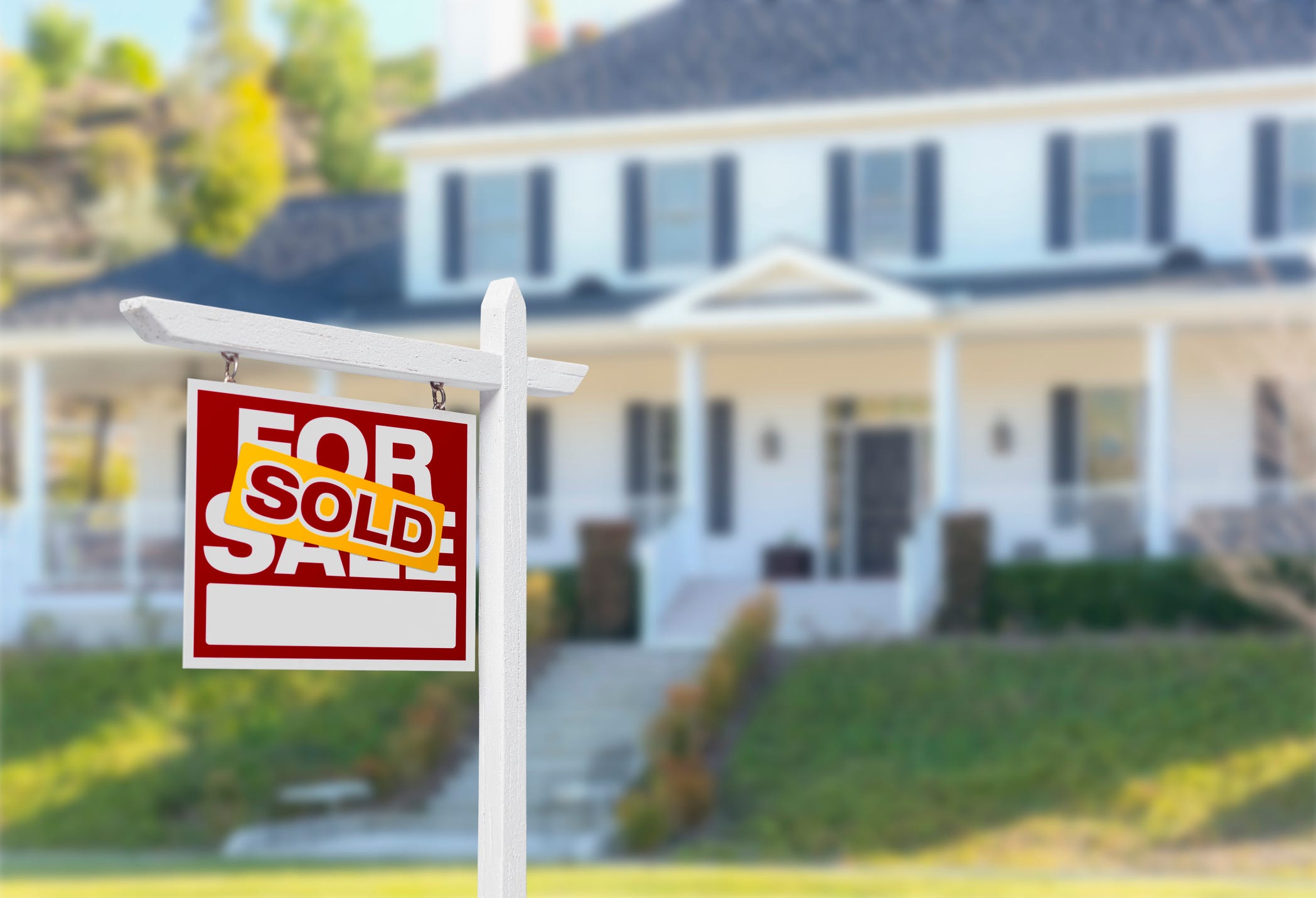 how to buy house while selling another